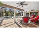 Relaxing patio furniture near the pool at 3312 Cobbs Ct, Palm Harbor, FL 34684