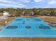 Outdoor basketball court with two hoops at 3917 Briarlake Dr, Valrico, FL 33596