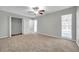 Spacious bedroom with neutral walls and carpeting at 3917 Briarlake Dr, Valrico, FL 33596