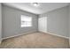 Spacious bedroom with neutral walls and carpet at 3917 Briarlake Dr, Valrico, FL 33596