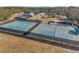 Aerial view of several tennis courts at 3917 Briarlake Dr, Valrico, FL 33596