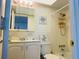 Bathroom with tub, shower, and vanity at 400 Glennes Ln # 108, Dunedin, FL 34698