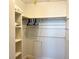 Spacious closet with shelving and hanging rod at 400 Glennes Ln # 108, Dunedin, FL 34698