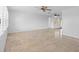 Spacious living room offers ample natural light and tile floors throughout at 4001 Harbor Hills Dr, Largo, FL 33770