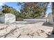 Large backyard with gravel and storage shed at 4020 S West Shore Blvd, Tampa, FL 33611