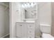 Bathroom with white vanity and toilet at 4020 S West Shore Blvd, Tampa, FL 33611