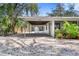 Covered carport with access to the house and backyard at 4020 S West Shore Blvd, Tampa, FL 33611