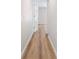 Light hallway with wood-look floors at 4020 S West Shore Blvd, Tampa, FL 33611