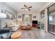 Light beige sectional sofa, wood coffee table and wood floors at 4079 Overture Cir # 346, Bradenton, FL 34209