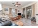 Light beige sectional sofa, wood coffee table and wood floors at 4079 Overture Cir # 346, Bradenton, FL 34209