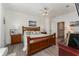 King-size bed, ceiling fan, and ample closet space highlight this main bedroom at 4079 Overture Cir # 346, Bradenton, FL 34209