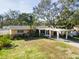 Aerial view of a single-Gathering home with a large backyard and neighborhood context at 4400 Carson Ne St, St Petersburg, FL 33703