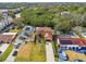 Aerial view showing home, pool, and canal access at 4414 Waltham Dr, Tampa, FL 33634