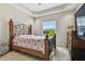 Cozy bedroom with a floral-patterned bedspread at 4414 Waltham Dr, Tampa, FL 33634