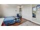 Cozy bedroom with wood floors and ample closet space at 4414 Waltham Dr, Tampa, FL 33634