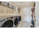 Convenient laundry room with washer and dryer included at 4414 Waltham Dr, Tampa, FL 33634