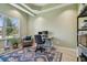 Home office with a large window and stylish rug at 4414 Waltham Dr, Tampa, FL 33634