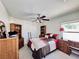 Bedroom with double bed and ample storage at 4514 Arizona Sun Ct, Valrico, FL 33594