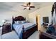 Main bedroom with a king-size bed and ensuite bathroom at 4514 Arizona Sun Ct, Valrico, FL 33594