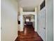 Bright entryway with wood floors leading to living room at 4514 Arizona Sun Ct, Valrico, FL 33594