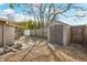 Large shed in backyard next to wooden fence at 5157 School Rd, New Port Richey, FL 34653