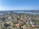 Aerial shot highlighting the property's location in a leafy neighborhood with proximity to bay and city at 540 Villagrande S Ave, St Petersburg, FL 33707