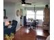 Dining room with round table, black and white tablecloth, and chandelier at 568 Seacrest Dr, Largo, FL 33771