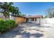 House exterior with a driveway and landscaping at 5720 Venetian Ne Blvd, St Petersburg, FL 33703