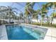 Relaxing swimming pool with screened enclosure at 5720 Venetian Ne Blvd, St Petersburg, FL 33703