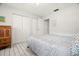 Bedroom with double closet and comfortable bed at 6075 Shore S Blvd # 103, Gulfport, FL 33707