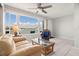 Living room with water views and comfortable seating at 6075 Shore S Blvd # 103, Gulfport, FL 33707