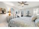 Bright bedroom with comfortable bed and built-in dresser at 6075 Shore S Blvd # 103, Gulfport, FL 33707