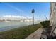 Enjoy waterfront views from this peaceful patio area at 6075 Shore S Blvd # 103, Gulfport, FL 33707