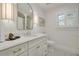 Modern bathroom with white vanity, quartz countertop, and stylish fixtures at 620 26Th N Ave, St Petersburg, FL 33704