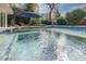 Relax in this luxurious pool and spa with built-in seating at 620 26Th N Ave, St Petersburg, FL 33704