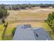 Fenced backyard with view of home's roofline at 6230 Plover Meadow St, Lithia, FL 33547