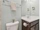 Small bathroom with white vanity, toilet and shower at 6230 Plover Meadow St, Lithia, FL 33547