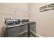 Well-equipped laundry room with Samsung washer and dryer at 6230 Plover Meadow St, Lithia, FL 33547