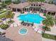 Community pool with spa and surrounding lounge areas at 6230 Plover Meadow St, Lithia, FL 33547