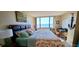 Main bedroom with water views and private balcony at 6322 Palma Del Mar S Blvd # 401, Tierra Verde, FL 33715