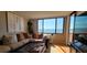 Living Room with bay views and comfortable seating at 6322 Palma Del Mar S Blvd # 401, Tierra Verde, FL 33715