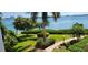 Scenic waterfront view with lush landscaping at 6322 Palma Del Mar S Blvd # 401, Tierra Verde, FL 33715