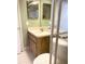 Bathroom with shower and single sink vanity at 7947 Radcliffe Cir, Port Richey, FL 34668