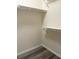 Spacious closet with wire shelving and grey flooring at 7947 Radcliffe Cir, Port Richey, FL 34668