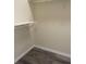 Walk-in closet with wire shelving for storage at 7947 Radcliffe Cir, Port Richey, FL 34668