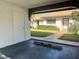 Interior of the garage, with a storage unit and a view of the exterior at 7947 Radcliffe Cir, Port Richey, FL 34668