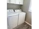 Bright laundry room with washer and dryer included at 7947 Radcliffe Cir, Port Richey, FL 34668