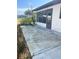 Spacious concrete patio adjacent to home at 7947 Radcliffe Cir, Port Richey, FL 34668