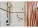 Clean bathroom with tub, shower, and updated fixtures at 9548 141St St, Seminole, FL 33776