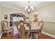 Elegant dining room with a chandelier and ornate chairs at 9548 141St St, Seminole, FL 33776